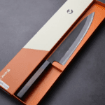 日野浦刃物 味方屋 牛刀 240mm<br>白紙鋼 黑打 黑檀八角柄