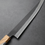 日野浦刃物 味方屋 筋引 240mm<br>白紙鋼 黑打梨地 橄欖木