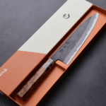 日野浦刃物 味方屋 牛刀 210mm<br> 白紙鋼 黑打鍛地墨流 特殊柄