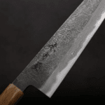 日野浦刃物 味方屋 牛刀 240mm<br> 白紙鋼 黑打鍛地墨流 特殊柄