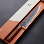 日野浦刃物 味方屋 牛刀 240mm<br> 白紙鋼 黑打鍛地墨流 特殊柄