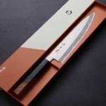 日野浦刃物 味方屋 牛刀 240mm<br>青紙鋼 有色大馬士革