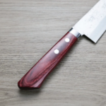 增谷訓生 牛刀 180mm VG10鋼<br>鎚目大馬士革 雪華 紅柄