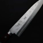 增谷訓生 牛刀 180mm VG10鋼<br>鎚目大馬士革 雪華 紅柄