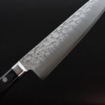 E9AB98E69D91E58883E789A920E7899BE5888020180mm20VG1020E98E9AE79BAE-5 高村刃物 牛刀 180mm VG10 鎚目